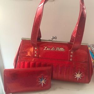 lux de ville red sparke w/ starburst logo